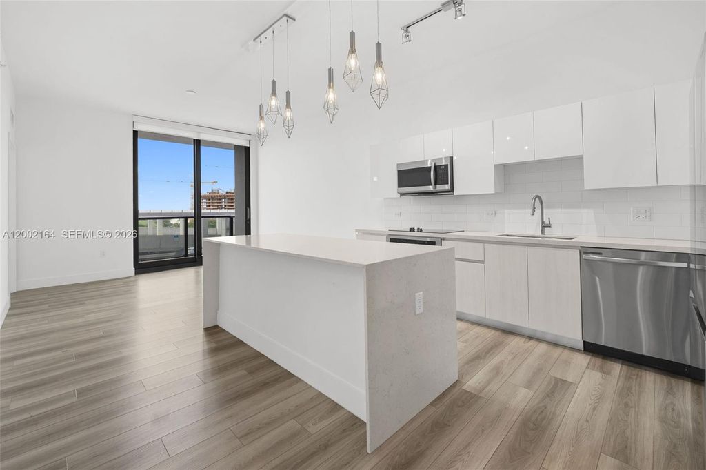 Photo of 101 Diplomat Pkwy #605, Hallandale Beach, FL 33009 (MLS # A12002164)