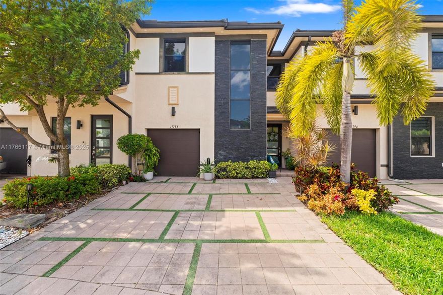 This beautiful townhouse is located in the prestigious Satori community in Miami Lakes. It features 3 spacious bedrooms and 2.5 bathrooms. The home boasts stunning wood stairs and laminated floors throughout. Additionally, the entire house is equipped with water purification filters for your convenience. The backyard is a true oasis, with tropical fruit trees including papaya, mango, and guava. The kitchen is outfitted with sleek quartz countertops, making it both stylish and functional.
 The Community has Clubhouse  2 pool and an GYM for your enjoyment and convenience. Situated near  schools, shopping centers, and a variety of restaurants, this home offers easy access to major expressways, making it a perfect location for families and professionals alike.
