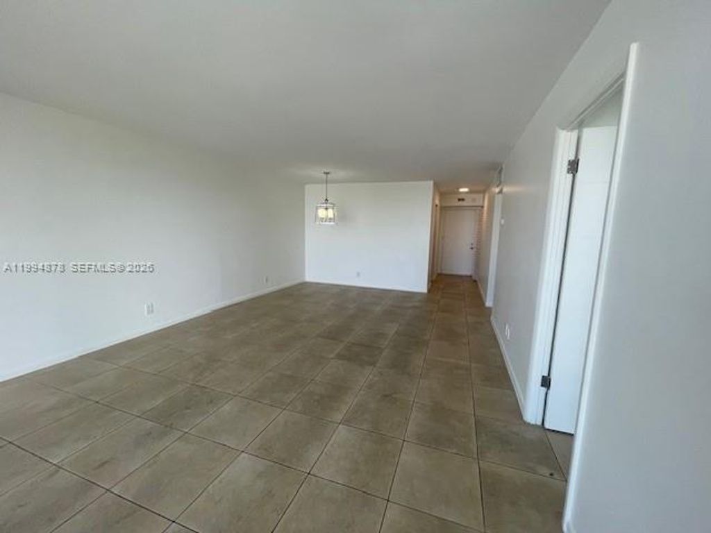 Photo of 1830 Dixieanna St #606, Hollywood, FL 33020 (MLS # A11994878)