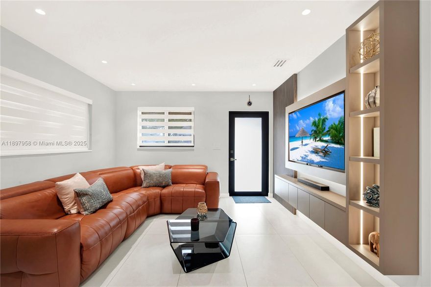 Completely remodeled home with exceptional attention to detail. Features a brand new modern kitchen with high-end appliances, sleek countertops, and custom cabinetry. New porcelain floors, baseboards, solid wood doors, impact windows, and a new metal roof. The backyard is an entertainer’s dream with a full outdoor kitchen, pergola, basketball area, lighting, and space for tennis. New landscaping, new fence, and covered awning for boat or truck parking. Every finish, fixture, and system is new, making this home truly one of a kind.