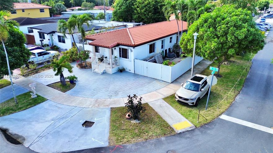 Beautifully updated 3 bedroom 2 bath plus separate 1/1 in law quarters. This Larger than tax roll 1650 SF Home has a large driveway with covered and uncovered patio spaces surrounding the property on all sides. It also includes storage sheds and a convenient covered work area with a rear and side entrance. Conveniently located near palmetto between Flagler & 8 St with plenty of shopping and dining options nearby. Must be seen to be appreciated, call for an appointment today.