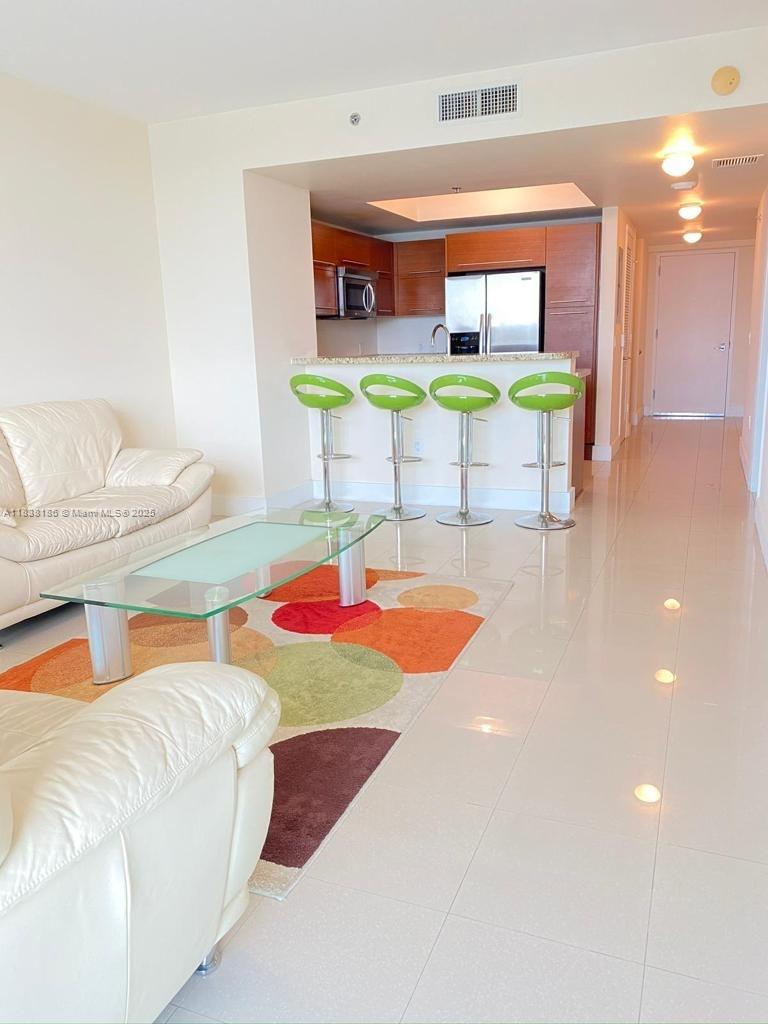 TAO SAWGRASS CONDOMINIUM - Residential