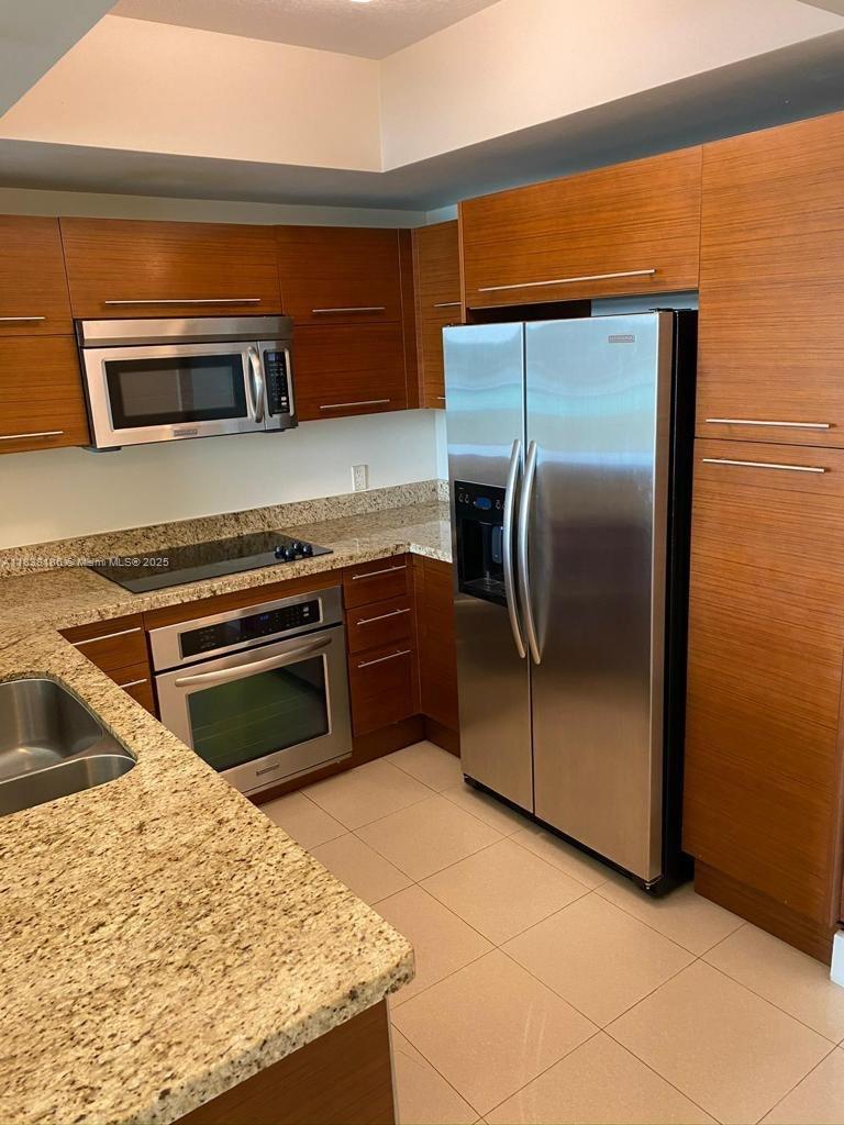 TAO SAWGRASS CONDOMINIUM - Residential