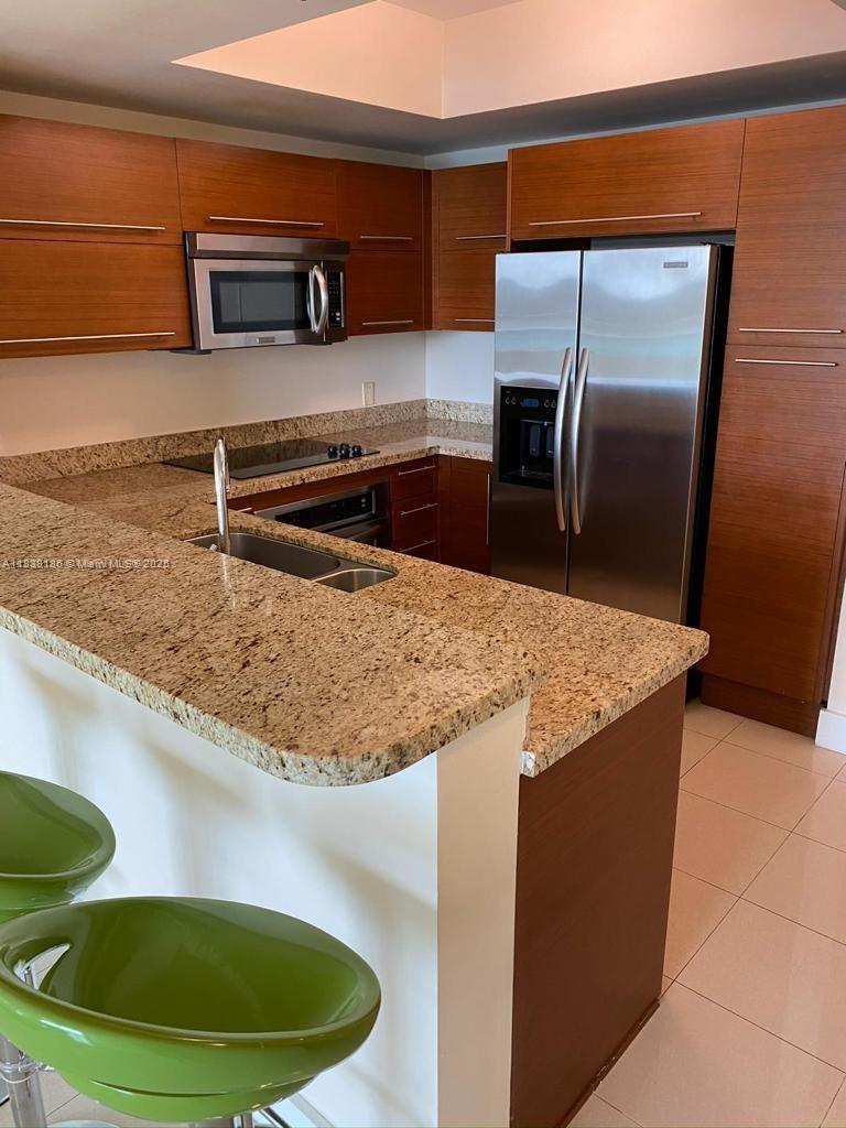 TAO SAWGRASS CONDOMINIUM - Residential