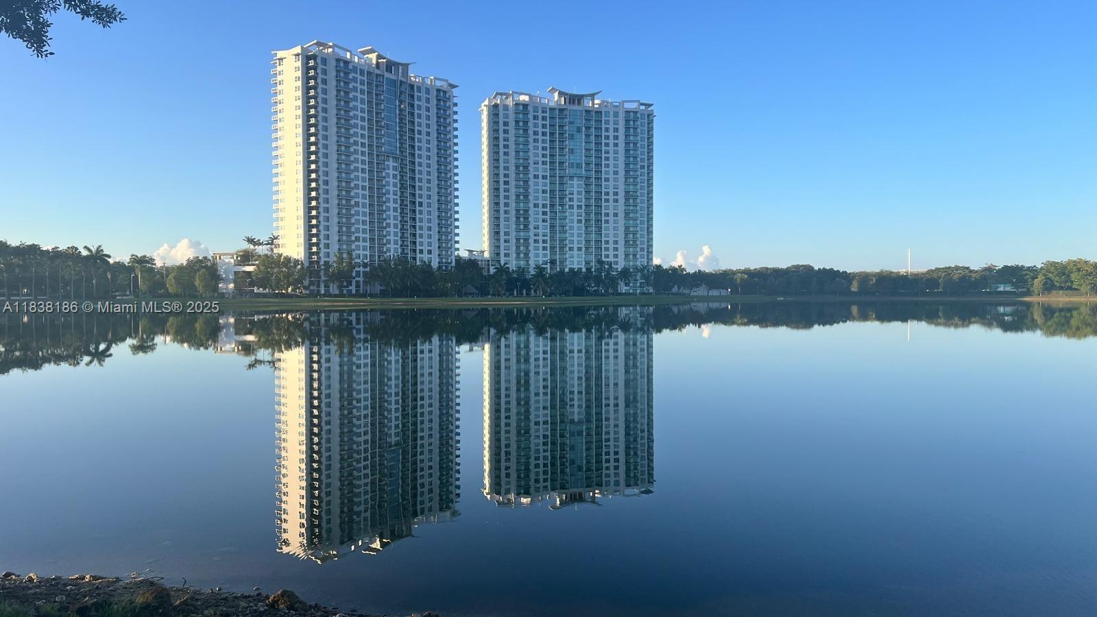 Spectacular 1 Bed plus DEN, 2 Baths apartment with a beautiful lake sunset views. Ceramic floor, Italian kitchen cabinets, granite countertops, washer & dryer in the unit. One parking space assigned. Tao features great amenities like gym, tennis court & pickleball, pool, BBQ and picnic tables, sport lounge room, conference room, playground and much more. Excellent location! Across the street from Sawgrass Mill Mall and 15 minutes West of Fort Lauderdale. Property is currently rented for $2,350.00 until April 23, 2026. GREAT INVESTMENTS OPPORTUNITY!