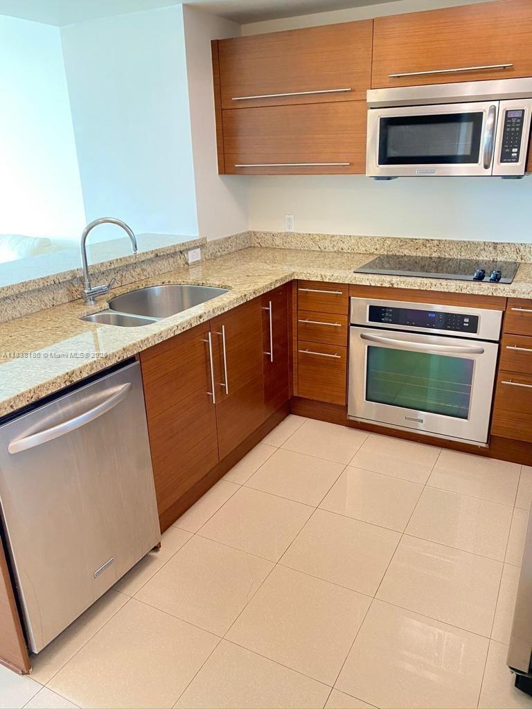 TAO SAWGRASS CONDOMINIUM - Residential