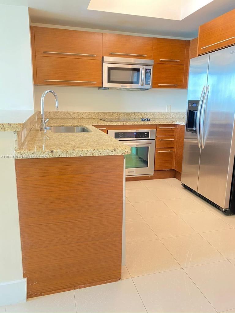 TAO SAWGRASS CONDOMINIUM - Residential