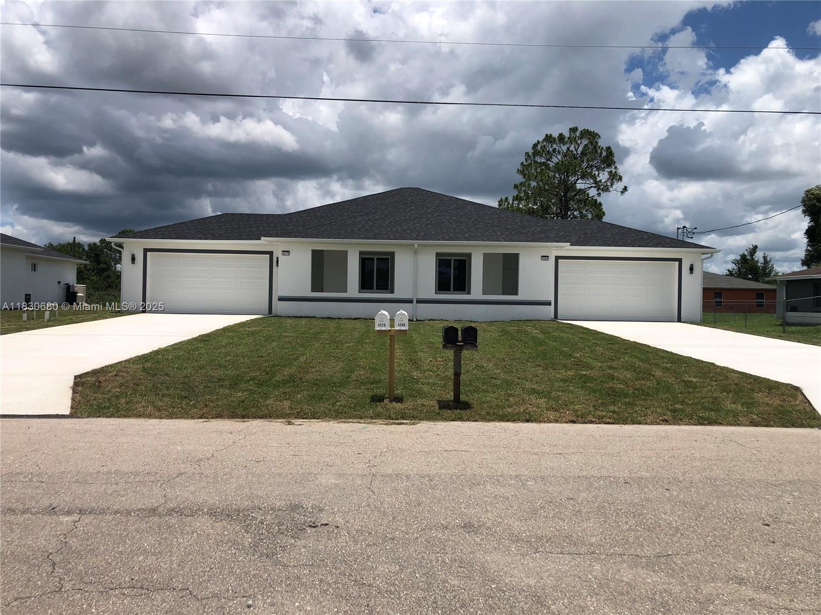 This newly constructed duplex represents an exceptional income property. It features 9’5’’ ceiling heights in bedrooms & 15’ in the living room. The kitchen includes white Shaker cabinetry, 42’ wall cabinets with crown molding & granite countertops. The property also features a 2-car double garage and spacious driveways. Modern appliances include 2 washers and 2 dryers, as well as high-impact-rated windows and doors. The bathrooms are enhanced with frameless glass shower doors. Spanning approximately 3,920 SF with ample natural light, it includes both front and rear porches. Owners can occupy one unit while renting out the other, or lease both for investment. This property is ideal for large families and investors. C/O issued in July, following the successful completion of all inspections.