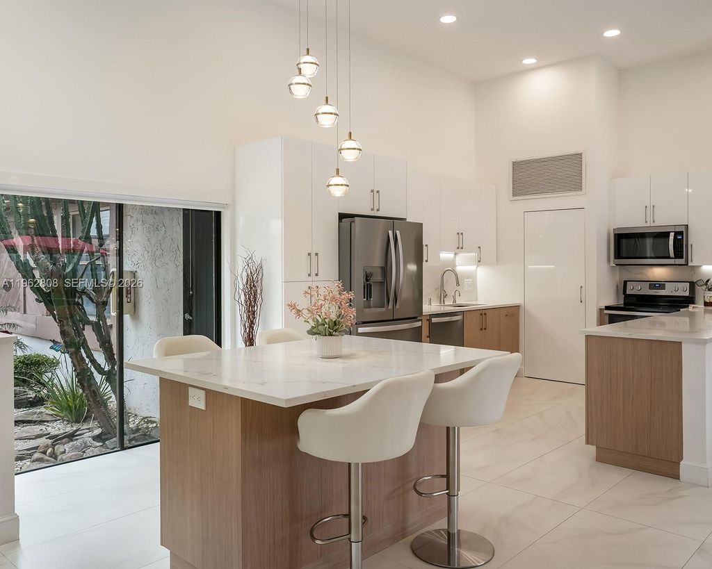 Photo of 413 Leslie Dr, Hallandale Beach, FL 33009 (MLS # A11962808)