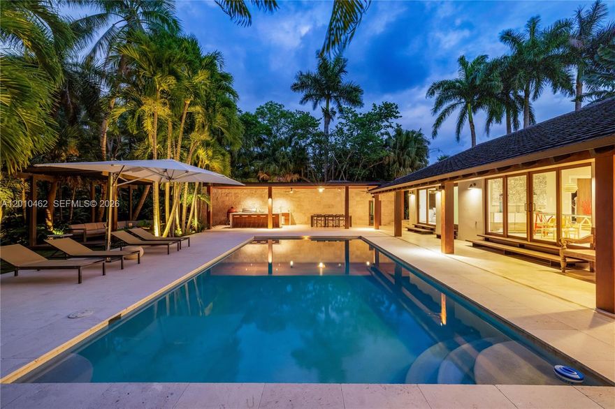 Nestled in the exclusive gated Entrada Estates community of Coconut Grove—a boutique small enclave with 24/7 security, a community tennis court and access to water—just fully remodeled in 2026, this residence offers 4,173 SF of sophisticated living, 702 SF additional space consisting of a gym and a bedroom with ensuite bathroom and over 2000 SF of wrap around terraces on a spacious over 1/2 acre lot. It features 5 bedrooms + flex room, 6.5 baths, large-format porcelain tiles, hardwood floors, soaring high ceilings, skylights, and massive impact glass windows/doors that flood the home with natural light and enable seamless indoor-outdoor flow.The custom chef’s kitchen impresses with Miele/Sub-Zero and Wolf appliances, sleek Dekton countertops, and top-tier finishes throughout. Outdoors, enjoy a heated large pool, built-in BBQ and kitchen on a shell-stone deck, and over 2,000 SF of covered living space surrounded by lush tropical landscaping. Just minutes from Coconut Grove’s vibrant shops, dining, top-rated schools, and world-class marinas—this home perfectly blends modern luxury with an unbeatable walkable location.