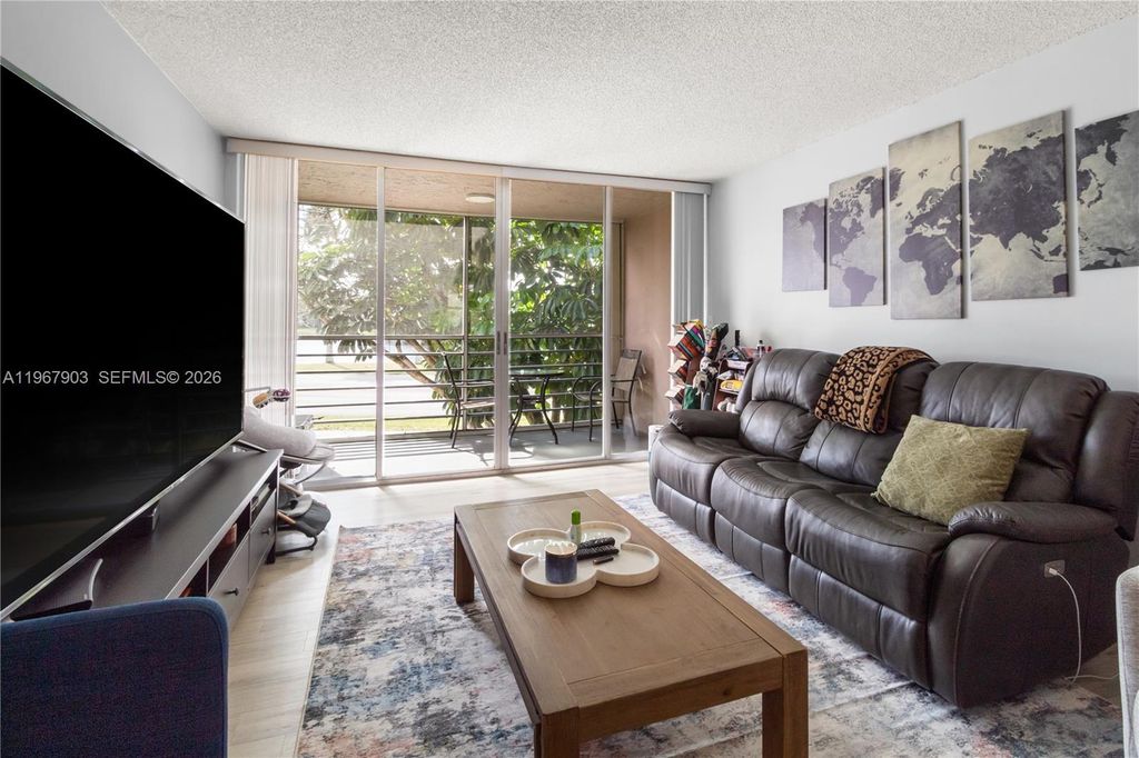 Photo of 9440 Tangerine Pl #202, Davie, FL 33324 (MLS # A11967903)