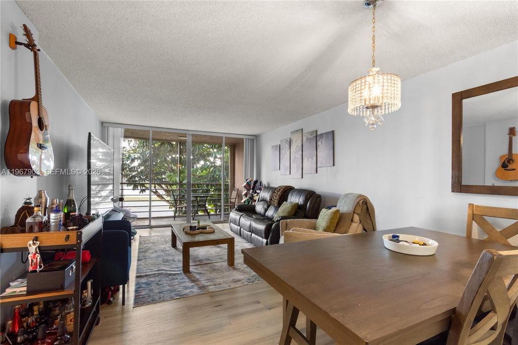 Photo of 9440 Tangerine Pl #202, Davie, FL 33324 (MLS # A11967903)