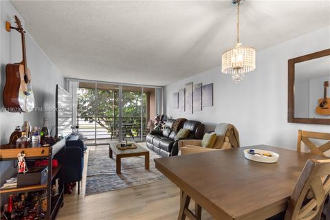 Photo of 9440 Tangerine Pl #202, Davie, FL 33324 (MLS # A11967903)