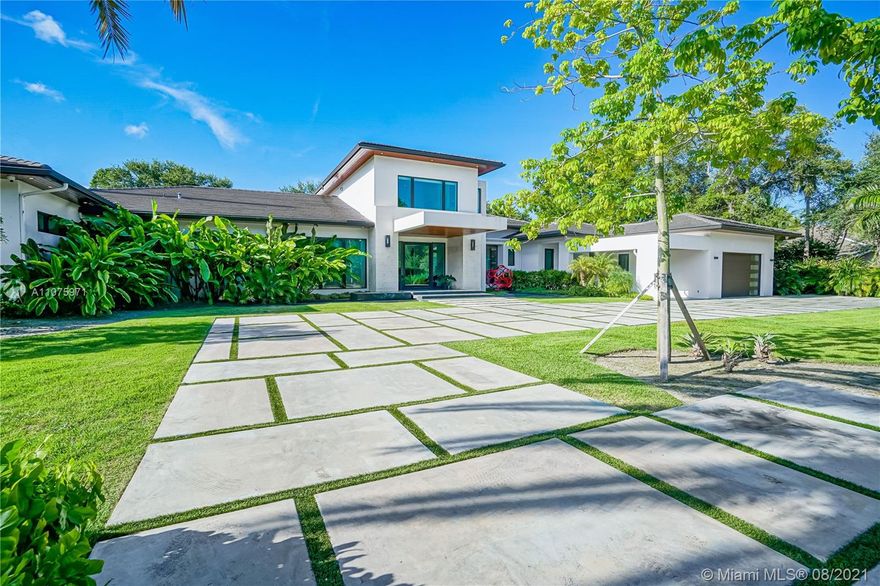 Beautiful home, located in N. Pinecrest. House sits on an oversized lot (50,965 Sq.Ft) built with incredible high end finishes. This 6 bedm, 8 bath, 1/2 bath, steam/cabana, 2 family rms, office & wonderful chef's kitchen delight, has been designed with great functionality & taste. Custom made European cabinetry & wood doors throughout. Marble fireplace. Solid Concrete roof, creating a  safe & easy to maintain roof.  
Oversized glass doors allow for a great view from every room & an airy house during the dry months. Marble slabs. Inviting oversized pool and Terraza great for hosting events. Full size generator, Sonos system. Awaiting for you to add finishing touches. Call listing agent to arrange visits. Send link to video to your clients https://vimeo.com/manage/videos/626960185/analytics