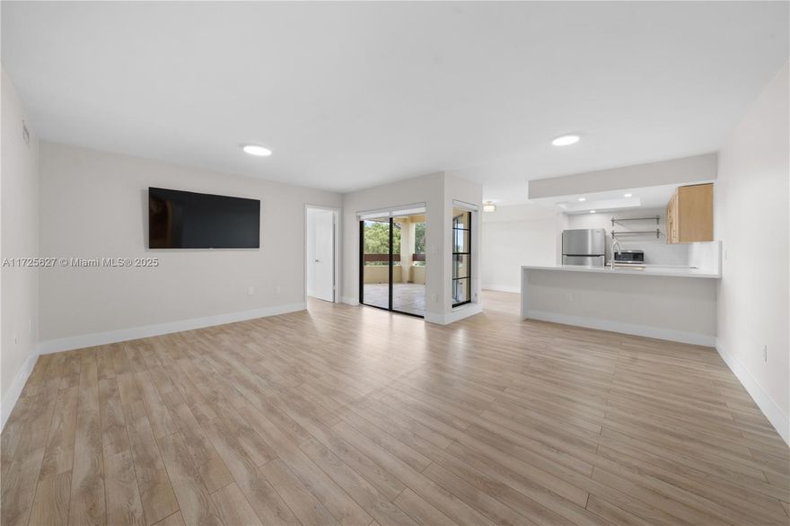 Spacious and remodeled 2-bedroom, 2-bathroom apartment in the desirable Kenland Bend North community. Located on the fourth floor of a gated community with 24/7 security, the unit features walk-in closets, an oversized balcony, and a washer and dryer inside. The building includes an elevator for convenience. Amenities offer a pool, clubhouse, tennis courts, and racquetball courts. Conveniently situated minutes from the Turnpike, with easy access to major shopping, restaurants, Baptist Hospital, MDC College, and FIU, all within 20 minutes.