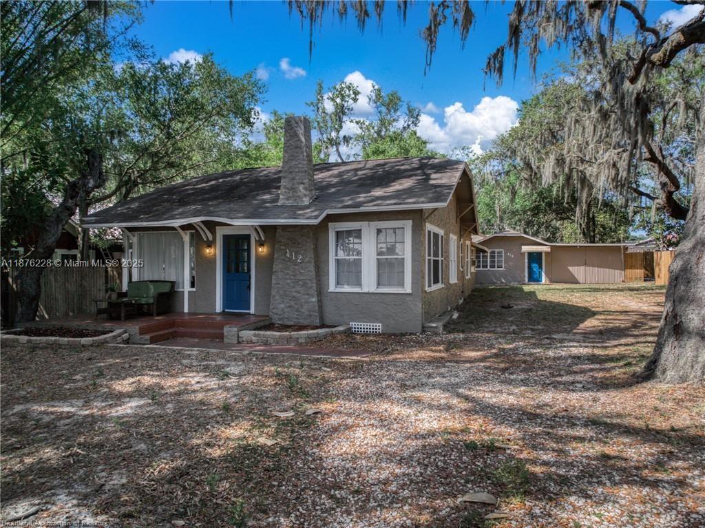 Vacant and turnkey! This multifamily property in Sebring offers two detached homes on a 0.41-acre lot with a recent $320K appraisal, giving buyers $30K in instant equity. The 1,711 sqft 3BR/2BA main home features fresh paint, a cozy fireplace, sunroom, dining area, storage/laundry space, front porch, shaded yard, gazebo, and new fencing. The 738 sqft 1BR/1BA secondary home offers an open living room, updated kitchen, private yard, and attached garage. Each home has separate meters, addresses, mailboxes, and entrances. Previously leased and also a successful short-term rental near Downtown Sebring. Ideal for investors, extended families, or buyers looking to live in one home and rent the other.