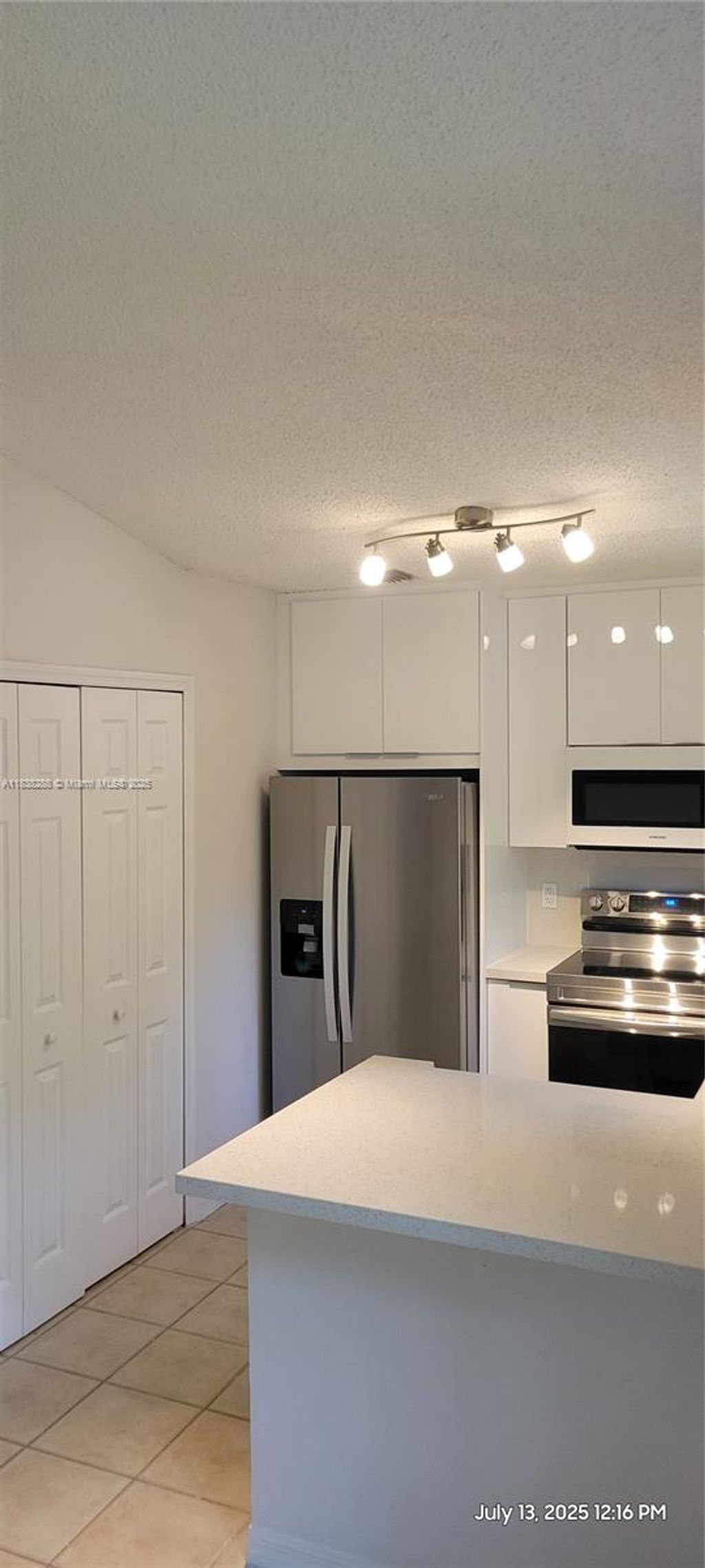 Photo of 2125 NW 77th Way #201, Pembroke Pines, FL 33024 (MLS # A11838288)