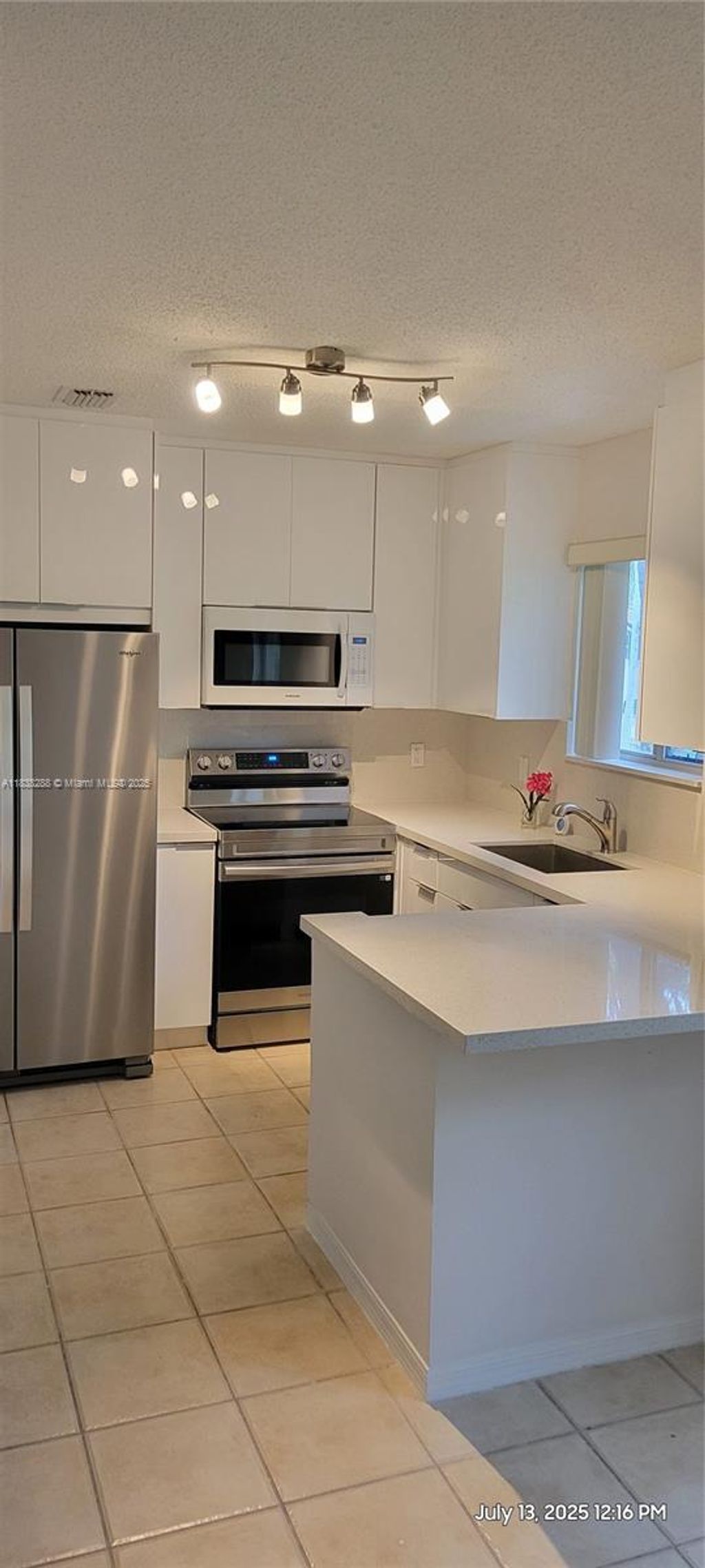 Photo of 2125 NW 77th Way #201, Pembroke Pines, FL 33024 (MLS # A11838288)