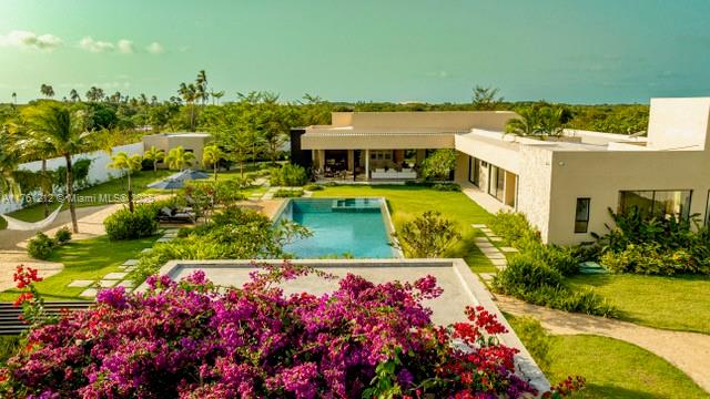 Located in Ceara, Brazil, this stunning 3 beds, 3.5 baths villa, blends sophisticated design w/ tropical elegance. Nestled on an expansive 34,875 sqft, this retreat features luxury & comfort. Fully furnished; outdoor retreat w/ an oversized pool, jacuzzi, spa, & gym; lush tropical gardens; generator; HVAC; prime location easily accessible by car, walking distance to the famous Alchymist Beach CLUB, lakes & dunes, 20 min scenic drive to Jericoacoara’s world renowned beaches & fine dining, 35min drive to Prea Beach, known as one of the best places for kitesurfing in the world. A perfect blend of exclusivity, relaxation,& adventure in 1 of Brazil’s most sought-after destinations. A luxurious private retreat or a high-end investment property, this is an opportunity you don’t want to miss