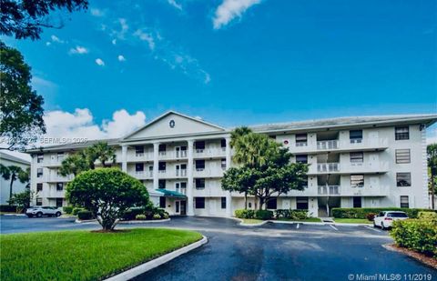 Photo of 1721 Whitehall Dr #101, Davie, FL 33324 (MLS # A12004624)