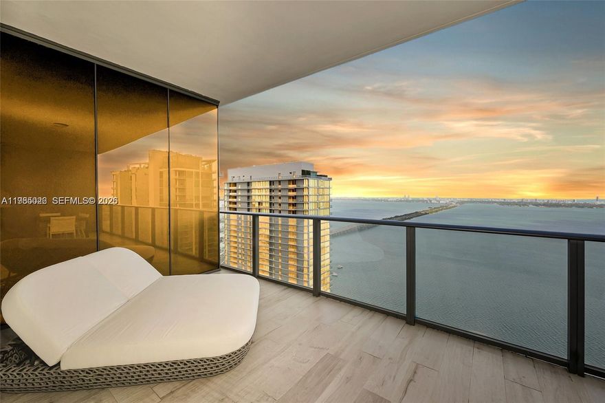 Experience elevated waterfront fully furnished living in this stunning 48th-floor residence at Gran Paraiso, now available for rent. This 2-bedroom, 3-bath condo offers modern design, floor-to-ceiling windows, and sweeping panoramic views of the Atlantic Ocean and Biscayne Bay—perfect for enjoying both sunrise and sunset.
The open-concept layout is filled with natural light and flows seamlessly into a sleek, chef-inspired kitchen featuring upgraded appliances, contemporary cabinetry, and stylish countertops. The spacious primary suite boasts breathtaking ocean views and a luxurious en-suite bathroom, while the second bedroom includes its own private bath for added comfort and privacy.
Residents enjoy access to resort-style amenities, including a waterfront pool, state-of-the-art fitness center, and tennis courts. Ideally located in Edgewater, just minutes from Wynwood, the Miami Design District, and Brickell, this home offers the perfect blend of luxury, convenience, and vibrant city living.