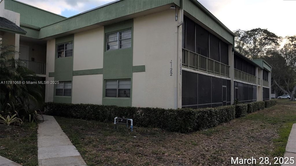 Photo of 4122 NW 88th Ave #103, Coral Springs, FL 33065 (MLS # A11781068)