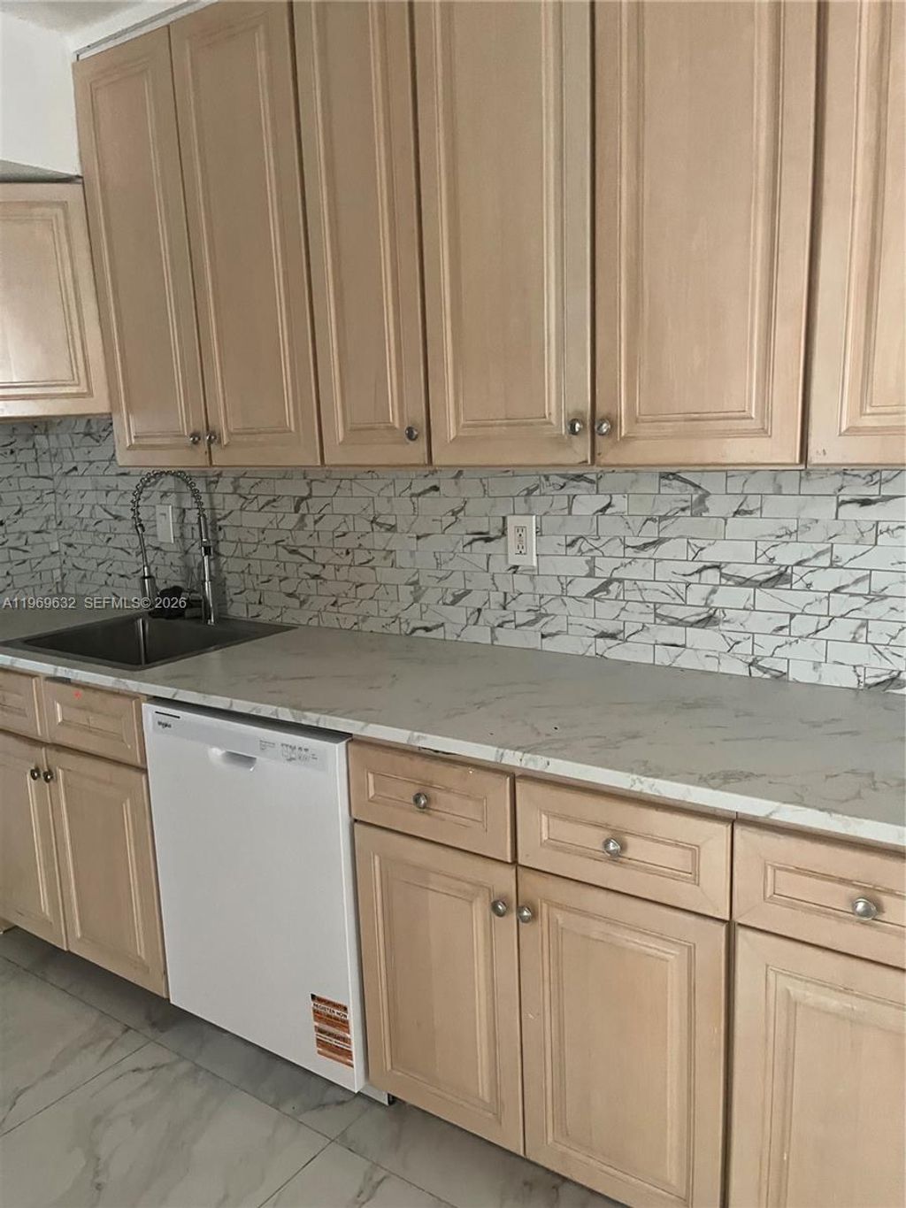 Photo of 6548 Racquet Club Dr #89, Lauderhill, FL 33319 (MLS # A11969632)