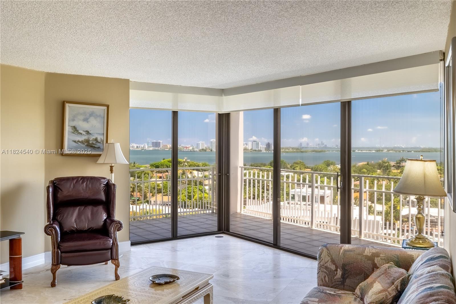 Spacious 2 Bedrooms and 2 bathrooms corner unit + extra 1BD ideal for a live-in aide, 1,538 SF with travertine floors and stunning SE water views from the 11th floor. Located in a 34-acre gated waterfront paradise in the heart of Miami. Resort-style amenities: private waterfront restaurant, spa with daily yoga, spinning, aqua aerobics, 8 tennis courts, racquetball, kids’ programs, heated saltwater pool, lush gardens, and waterfalls. Maintenance includes high-speed internet, water, and hot water. 40-year recertification completed with full reserves. A unique opportunity to enjoy luxury, nature, and security. Building maintenance is $1,938 and HOA is $825 total monthly: $2,763 No assessment in the building.