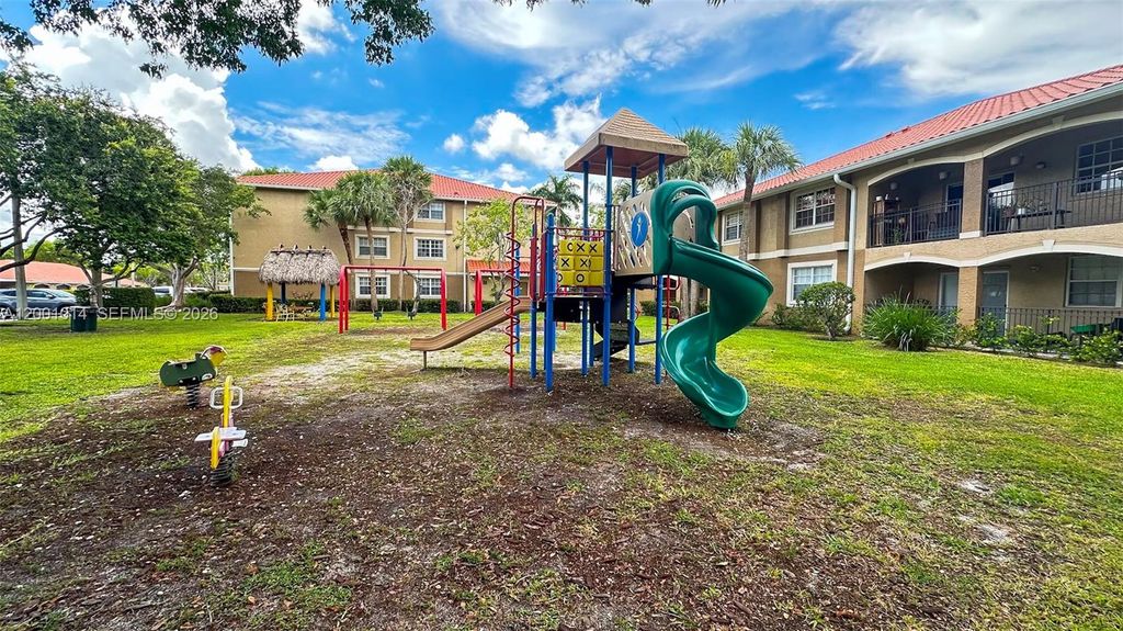 Photo of 11700 SW 2nd St #13-201, Pembroke Pines, FL 33025 (MLS # A12001014)