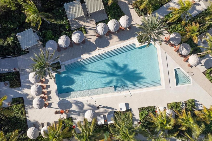 Mondrian Hallandale Beach Residences offers fully finished, move-in ready condominium residences with private terraces and views of the ocean and surrounding areas. The property features approximately 30,000 square feet of indoor and outdoor amenities. Amenities include a resort-style pool deck with private cabanas and summer kitchen, wine cellar and social lounge, movie screening room, game room, children’s playroom, simulator room, business center with conference rooms, podcast studio, pet grooming kiosk, EV charging stations, bicycle storage, and residential storage lockers. Fitness and wellness facilities include a state-of-the-art fitness center with dedicated yoga, Pilates, TRX and boxing studios, cycle and cardio studio, and a spa with sauna and private treatment rooms. Outdoor recreation includes open-air tennis courts with pickleball setup. Residents enjoy Beach Club access with chaise lounges, umbrellas, and towel service. Services include 24-hour concierge and valet parking. Optional à la carte services available; fees may apply. Conveniently located steps from golf, and near beaches, Gulfstream Park, Aventura Mall, dining, and shopping.