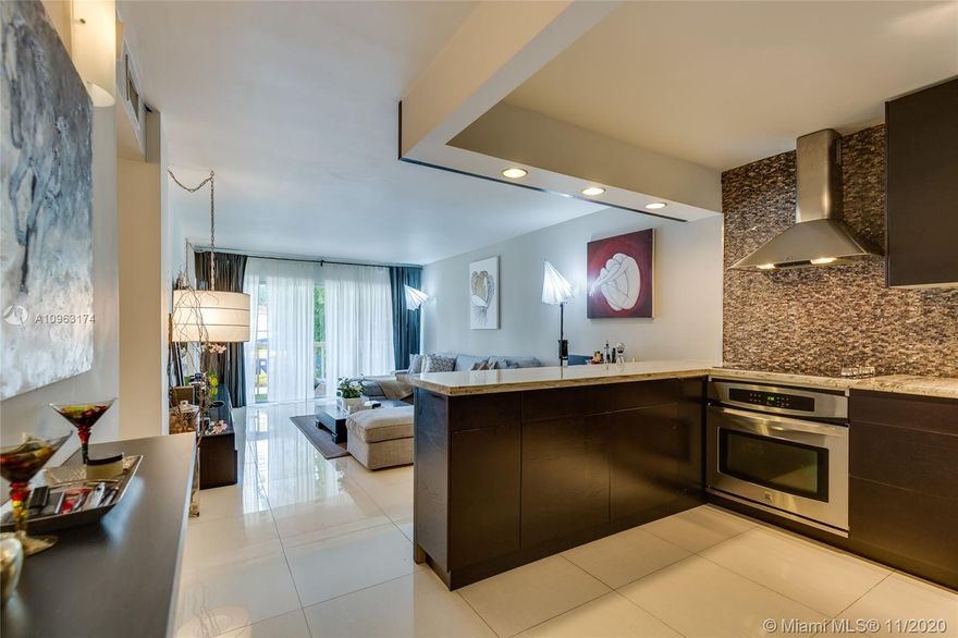 Ideally located just east of Biscayne Boulevard in the rapidly growing Miami Arts District, Riviera Towers is a Miami MiMo Classic. Beautiful Contemporary Styling sets the tone for this fully updated urban retreat. Enter spacious Foyer leading to a bright open floor plan with soft hewed porcelain floors. The custom contemporary kitchen is ideal for creative chefing and fun entertaining. The calm north facing open balcony to be comfortably sized. There is a half bath for gsts, tons of closet space & storage. The principal bedroom easily accommodates a king sized bed and add'l furniture. If you are looking for a home that is move-in ready, affordably priced with low Maint. Fees, look no further. Dogs are not permitted, OK to rent after 2 years, Building w/reserves see Broker Comments