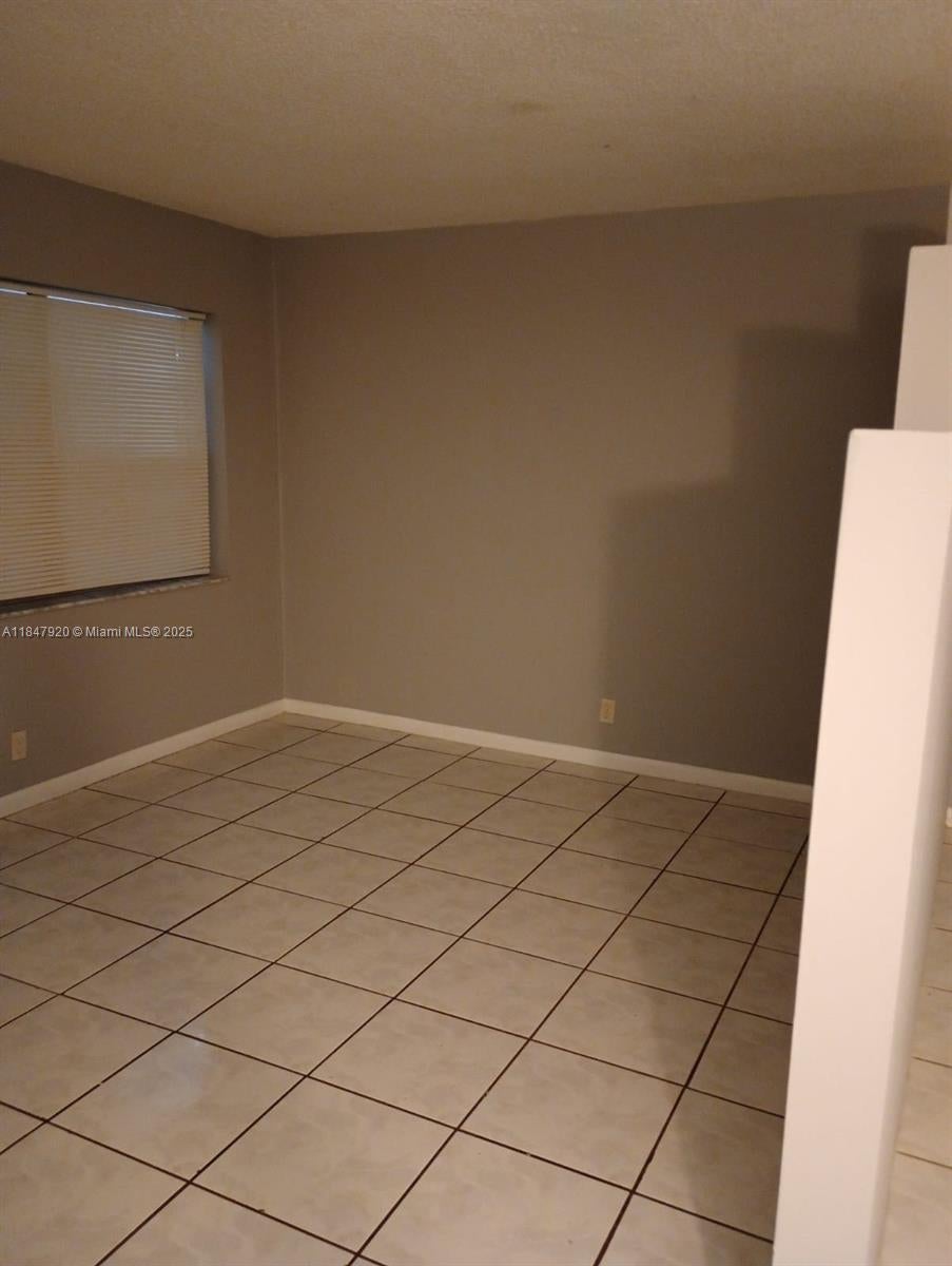 Photo of 1201 SW 50th Ave #211-4, North Lauderdale, FL 33068 (MLS # A11847920)