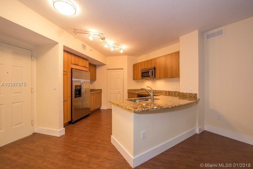 Nothing compares to this amazing 2 Bedroom + Den unit overlooking the pool from the fourth floor at the exclusive Veranda in Plantation. This was the developer model and it was upgraded with wood look tiled floors. The unit includes stainless steel appliances, new full size washer and dryer, granite counters and much more. A five minute walk from your door at Veranda can take you to a tree-lined path around a serene lake, or to a charming village center where you'll find everything from morning coffee and grocery shopping, to local banks and your favorite pizza. The Veranda has a 24 - concierge on duty, private security guards and cameras for extra security. Internet access, running water and basic cable is included at no extra charge.