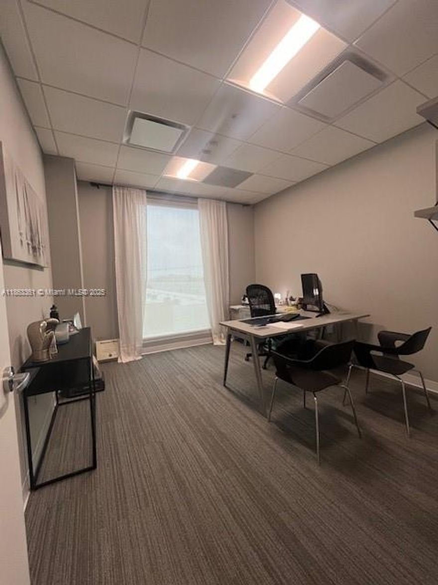 +/- 810 SF of Modern Office Space located in the Dolphin Professional Centre.
Well-maintained suite featuring two private offices, a drywall partition, an open work area, and carpeted flooring. Located in a professional building equipped with modern technology and infrastructure.