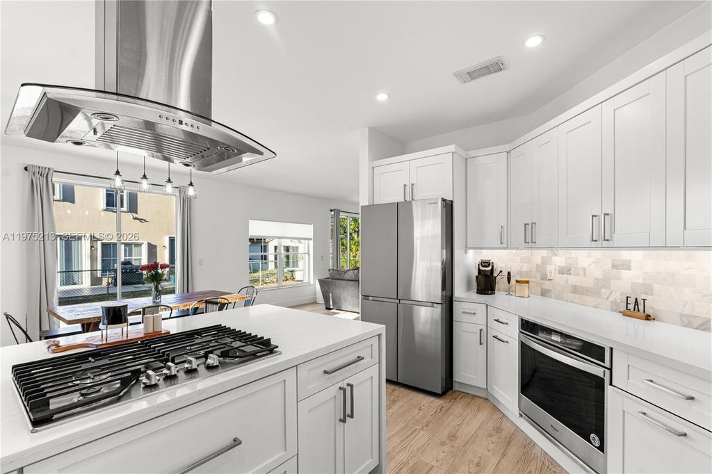 Photo of 20775 NW 1st St, Pembroke Pines, FL 33029 (MLS # A11975213)