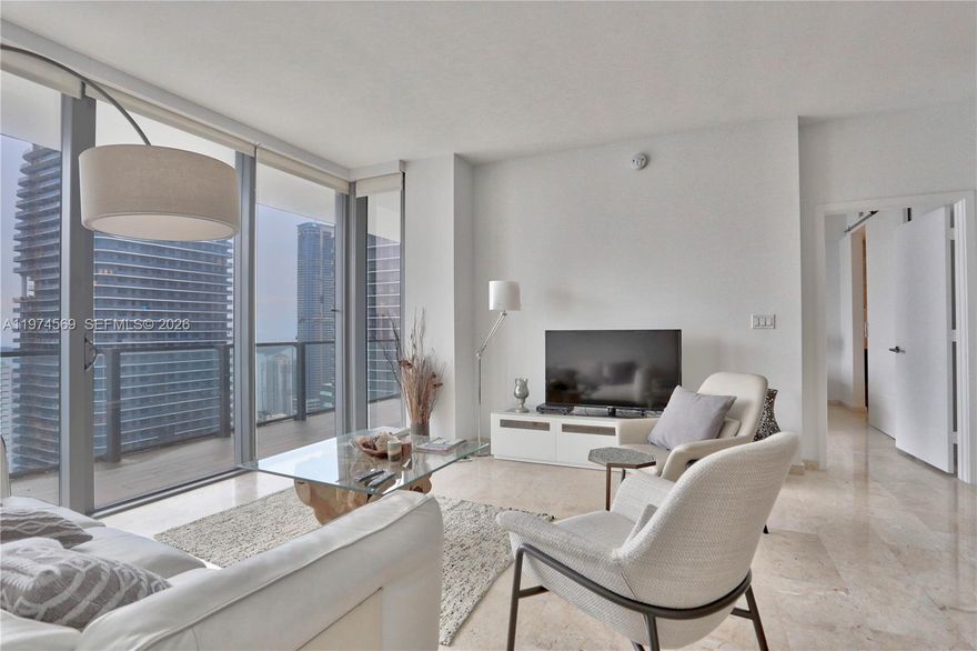 Live at Miami's landmark. This sweet apartment filled with natural light features amazing east view, marble floor and espresso kitchen. Building offers half-acre amenity deck, tropical garden, BBQ grills, multiple fitness area, kids play area heated pool with beverage and cafe service.