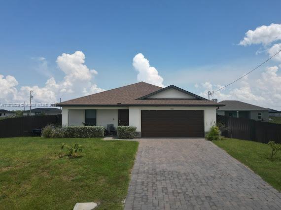 Welcome to this modern and spacious 2022-built home, located in a fast-growing area of Northwest Cape Coral, Ideally located near boating access, parks, shopping, dining, and the highly anticipated 7 Islands Gulf Gateway Resort and Marina Village, this home offers the perfect blend of modern features and thoughtfully crafted for comfort, functionality, and the Florida lifestyle —with no HOA. With a split floor plan, a long entry hallway, and an open living-dining-kitchen area, this home offers great functionality for families, guests, or rental potential. Throughout the home, you’ll find tile flooring, neutral tones, and recessed lighting, creating a clean and inviting atmosphere...with a fenced yard and room for a pool.
