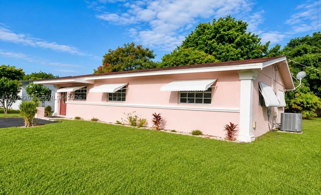 Photo of 2221 NW 30th Way, Fort Lauderdale, FL 33311 (MLS # A12072202)