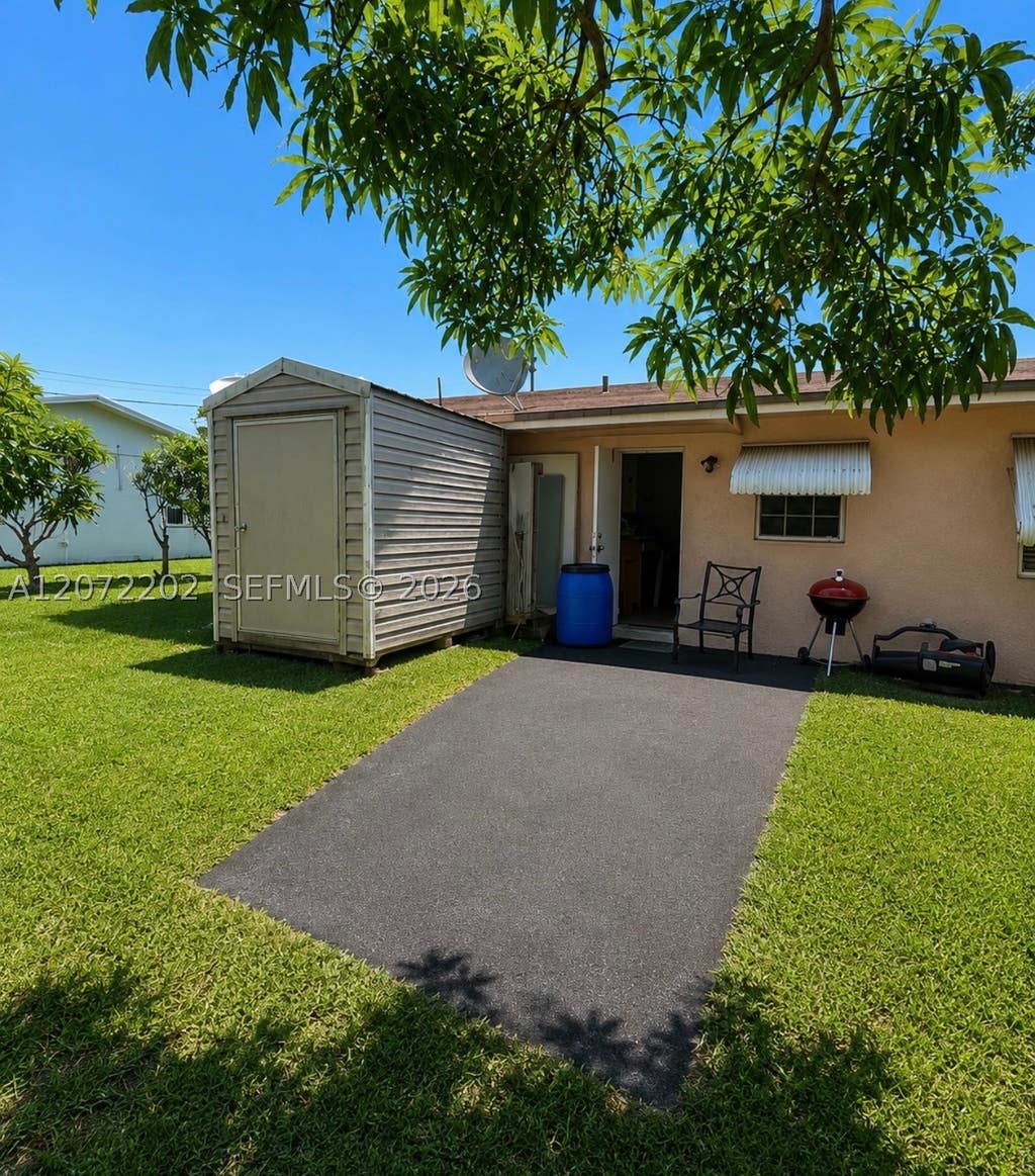 Photo of 2221 NW 30th Way, Fort Lauderdale, FL 33311 (MLS # A12072202)