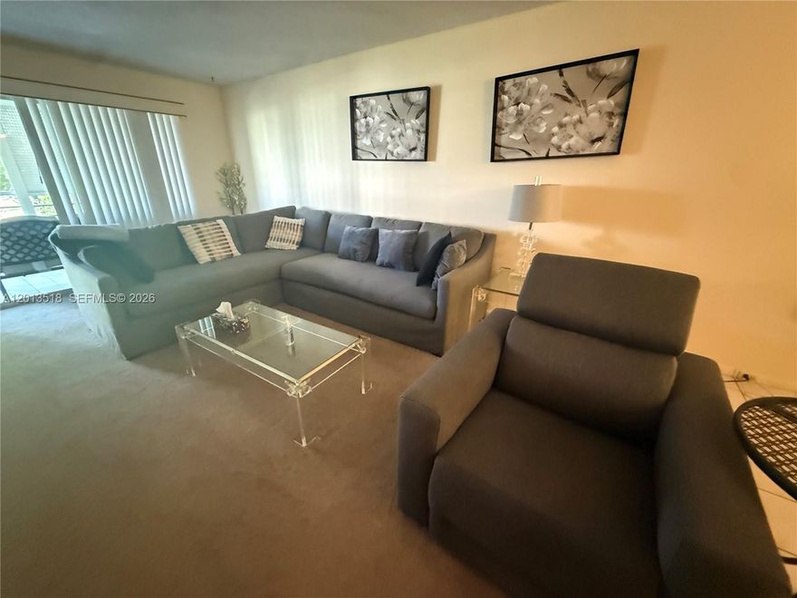 SEASONAL FURNISHED RENTAL located in the gated 55+ community of Wynmoor in Coconut Creek. Utilities included in the seasonal rental. Balcony equipped with patio furniture. Two bedrooms / 2 baths and the unit is located on the second floor. Building has assigned parking, guest spots and an elevator.