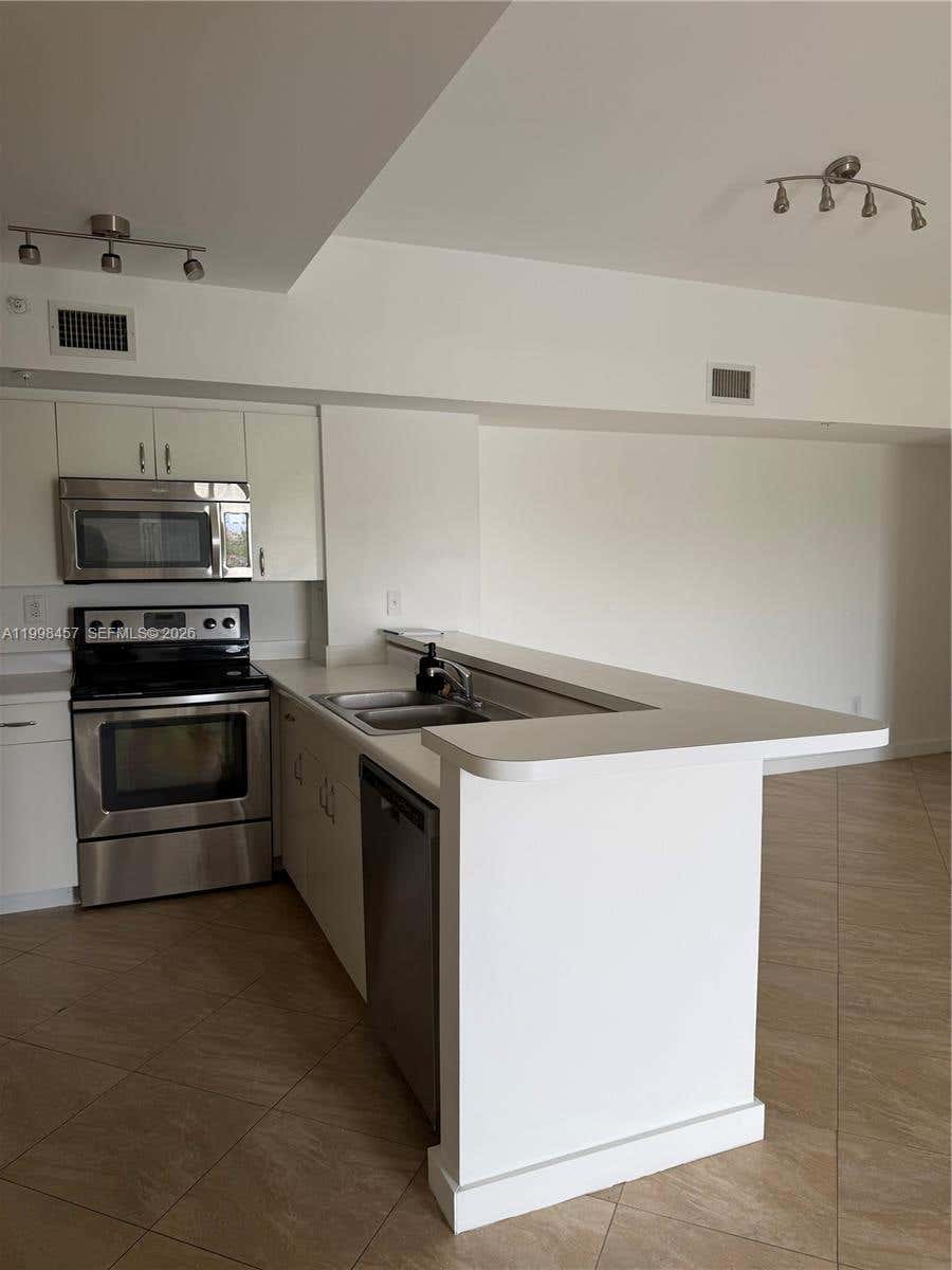 Photo of 2640 S University Dr #308, Davie, FL 33328 (MLS # A11998457)