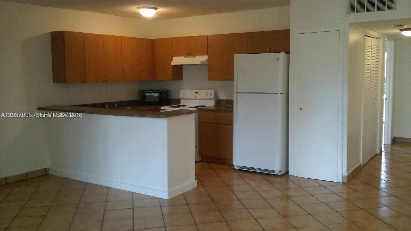 EASTSIDE MANOR CONDO - Residential Lease