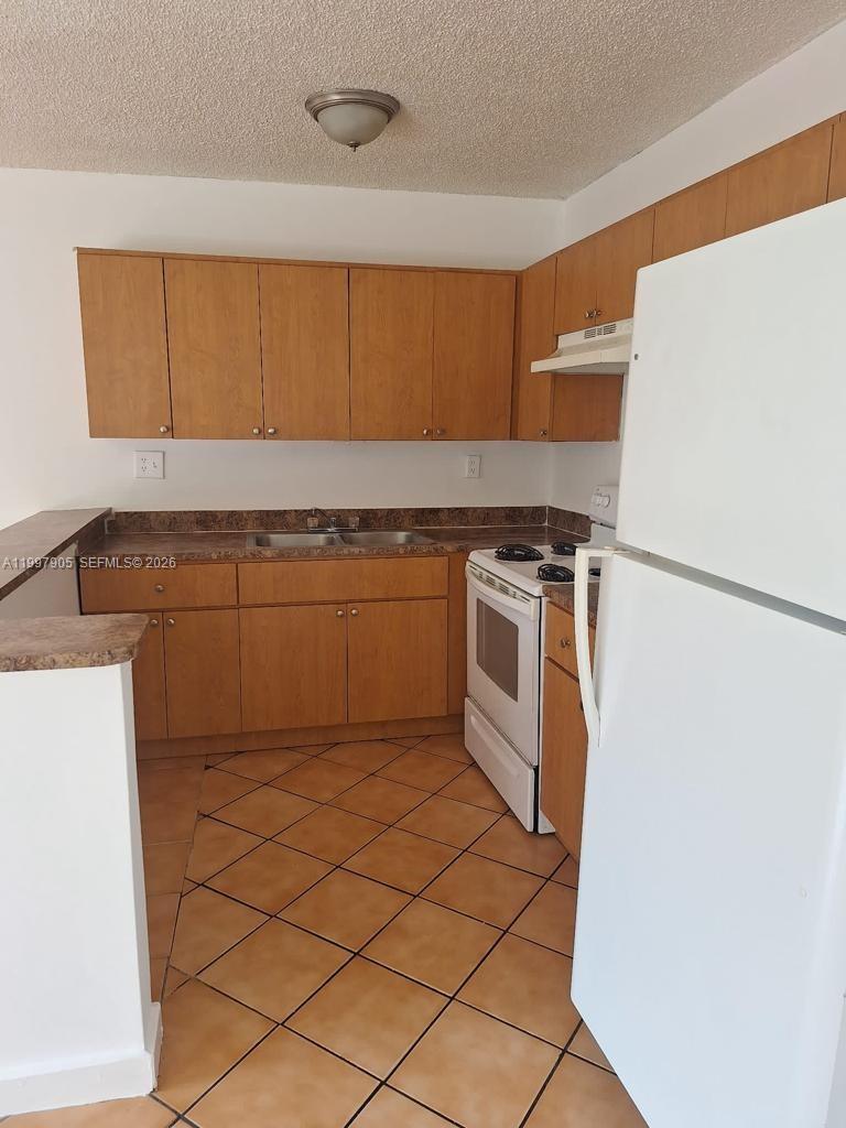 EASTSIDE MANOR CONDO - Residential Lease