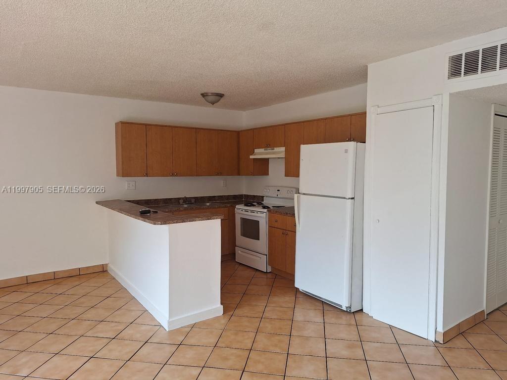 EASTSIDE MANOR CONDO - Residential Lease
