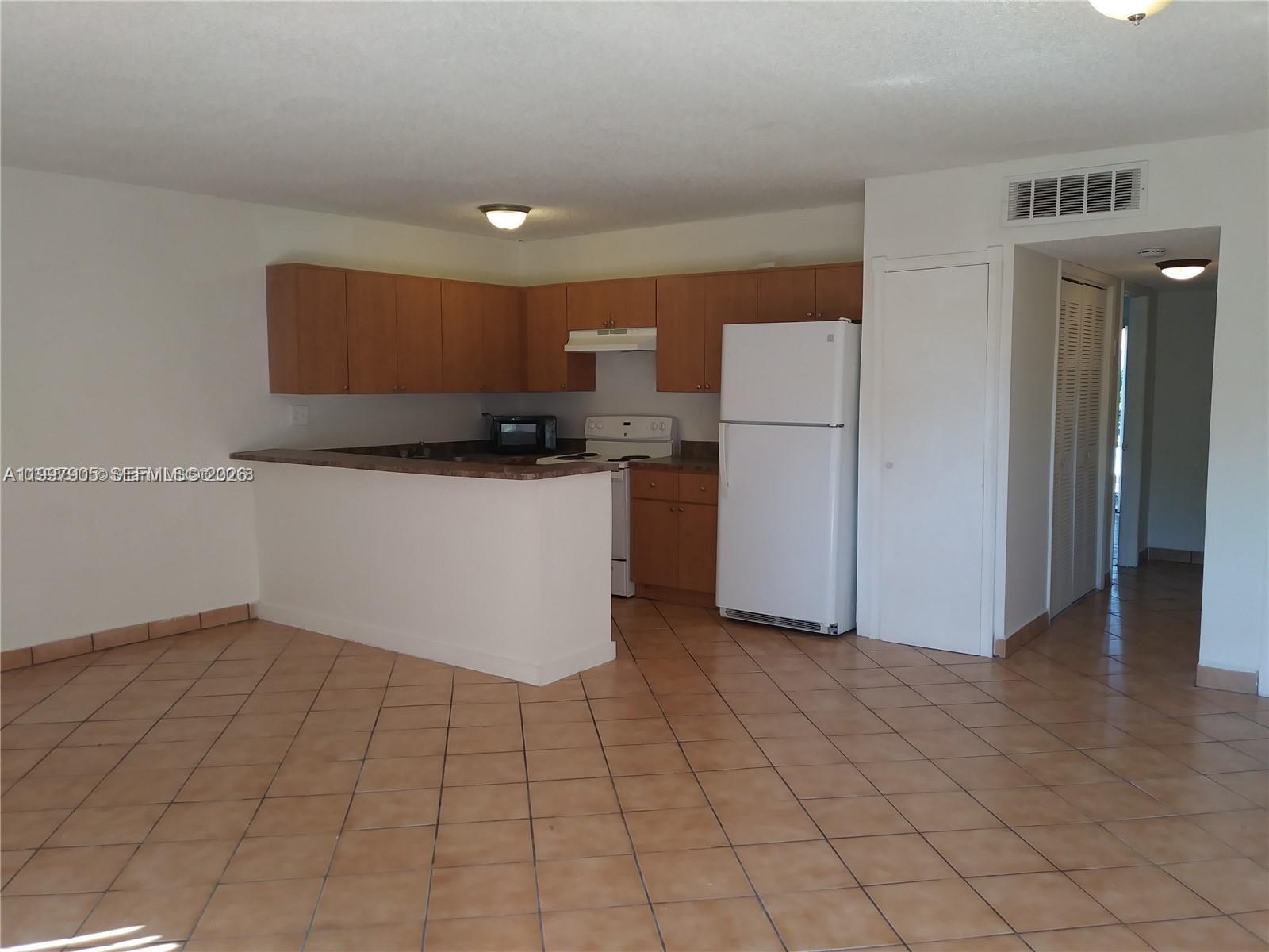 EASTSIDE MANOR CONDO - Residential Lease
