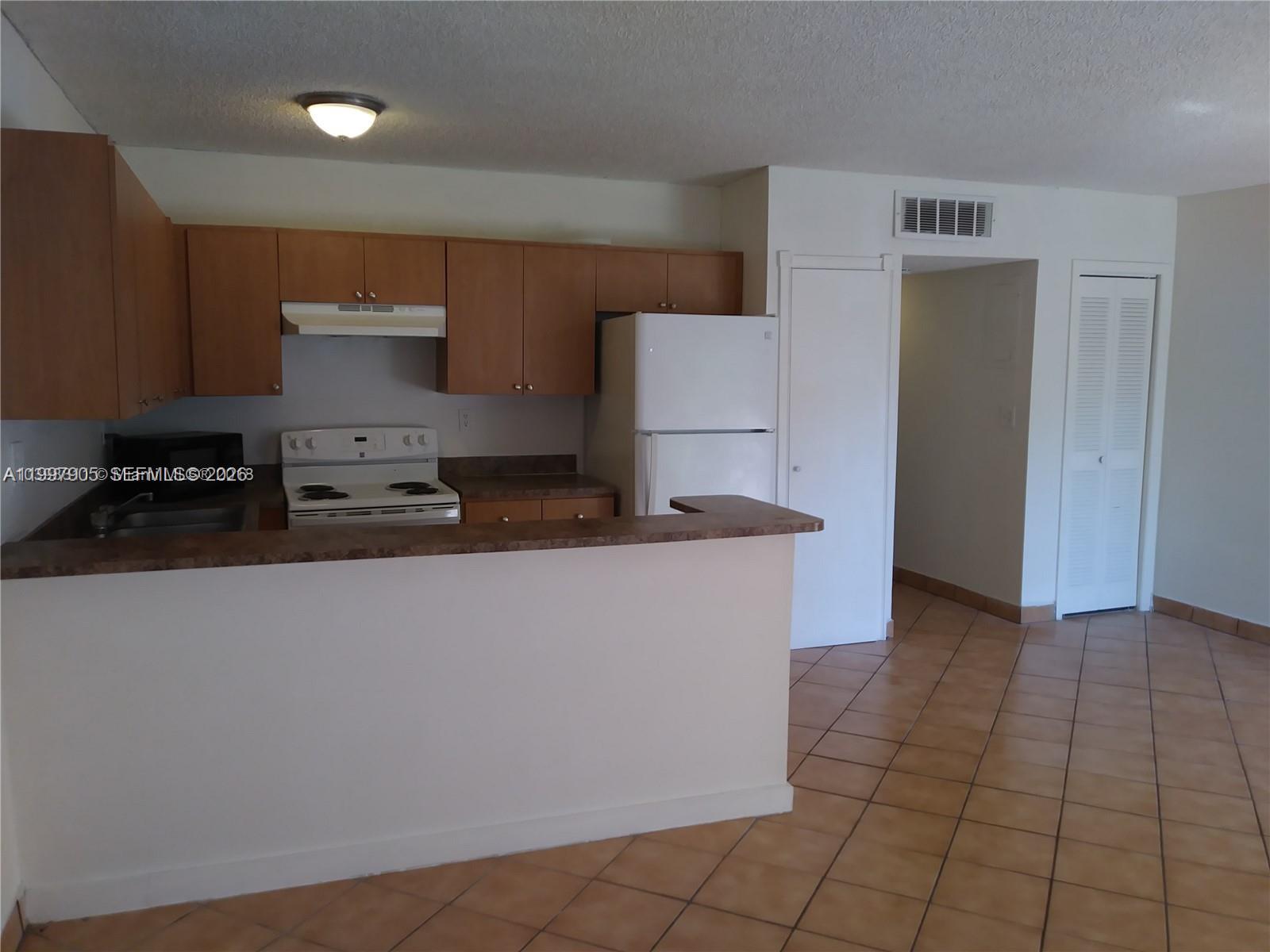 EASTSIDE MANOR CONDO - Residential Lease