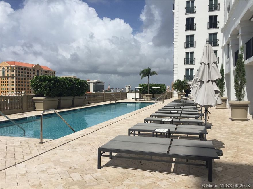 Very nice, bright & clean, freshly painted. fully tiled. Washer /Dryer in unit. Walk in closet. Assigned parking. Amenities on 6th floor includes swimming pool, fitness center, jacuzzi, spa, business center. Offers 24 hours concierge service. Card to front door and elevators. Walking distance to miracle mile and many restaurants.  Pool and lounging terrace with spectacular view of the City.