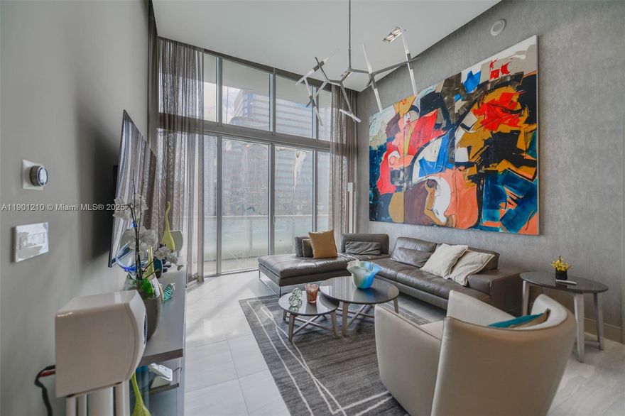 Experience the pinnacle of luxury living at ICON Brickell. This exquisite residence have been completely upgraded it.  It features soaring 16-foot ceilings, enhancing the sense of space and grandeur. With 2 bedrooms, 2 bathrooms, this unit is a haven for those who appreciate sophistication. Upon entering, you'll be captivated by the impressive double-height ceilings that invite natural light, creating an atmosphere of brightness and spaciousness. Immerse yourself in world-class amenities and enjoy a premier location in the dynamic Brickell neighborhood.
