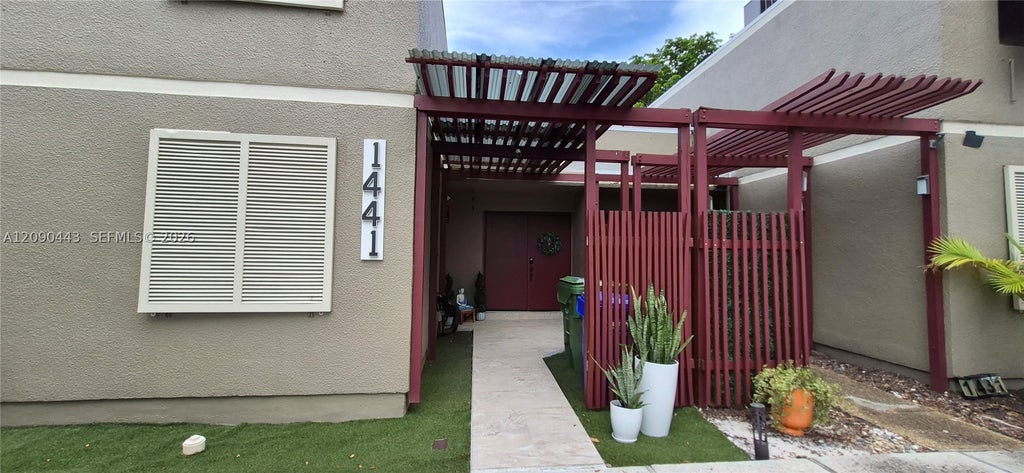 Photo of 1441 W Fairway Rd, Pembroke Pines, FL 33026 (MLS # A12090443)