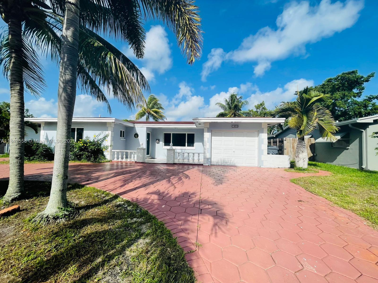 Discover this beautifully remodeled efficiency located at 1400 N 74th Ter, Hollywood, FL! This unit features 2 bedrooms, 1 bathroom, a functional kitchen, and well-distributed, naturally bright living spaces. Enjoy a spacious private patio, perfect for relaxing or spending time outdoors. Includes 1 assigned parking space and NO HOA, offering greater flexibility and fewer restrictions. Conveniently located in a quiet residential area near A+ schools, shopping centers, restaurants, and with easy access to major highways. An excellent opportunity to live comfortably with style in a prime location!